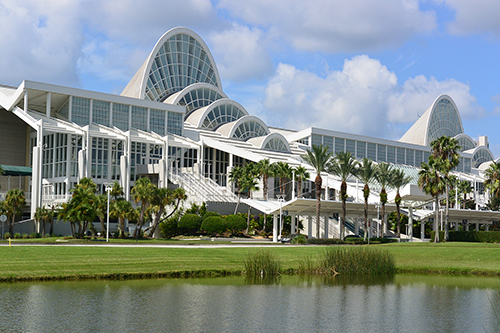Exterior shot of the Orlando Convention Center featuring its iconic roof arches